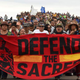 Native Americans march to a burial-ground sacred site that was disturbed by bulldozers building the Dakota Access Pipeline near Cannon Ball, N.D., on Sept. 4, 2016.
ROBYN BECK/AFP/Getty Images